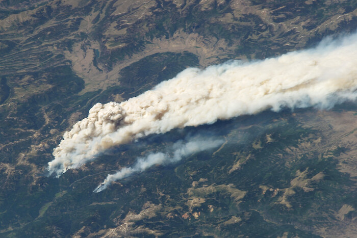 Aerial view of a wildfire, by NASA Goddard Space Flight Center.