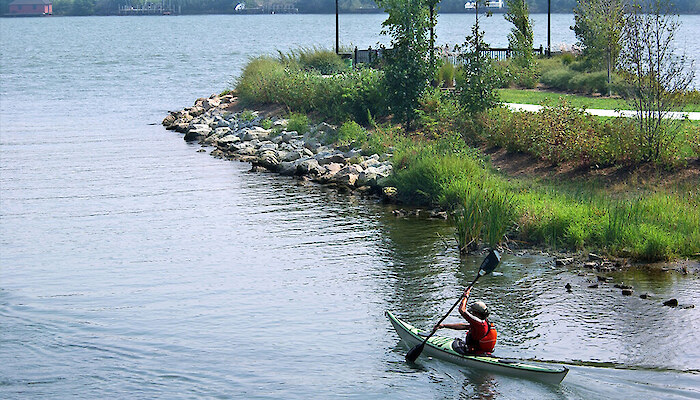 A kayaker peddles through waterways around Detroit, Michigan. Photo credit: Friends of the Detroit River.