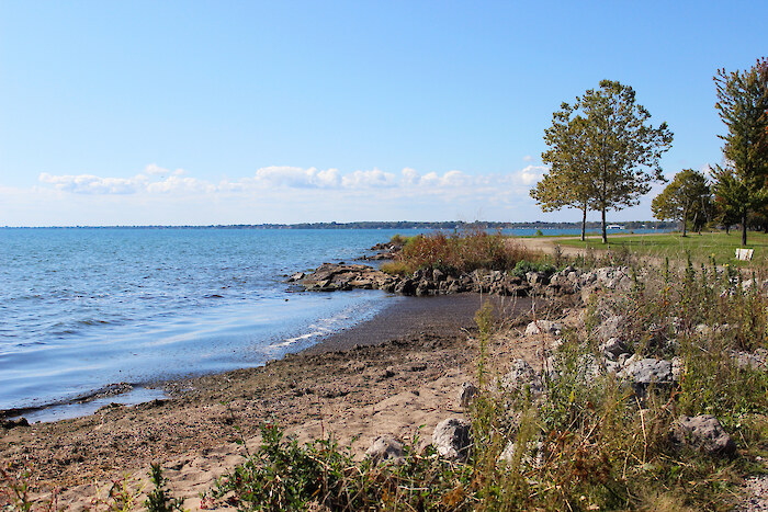 Small waves lap against the shore in Clinton, Michigan. Photo credit: Clinton River Watershed Council.